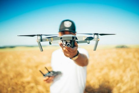 Professional drone operator preparing a drone for flight
