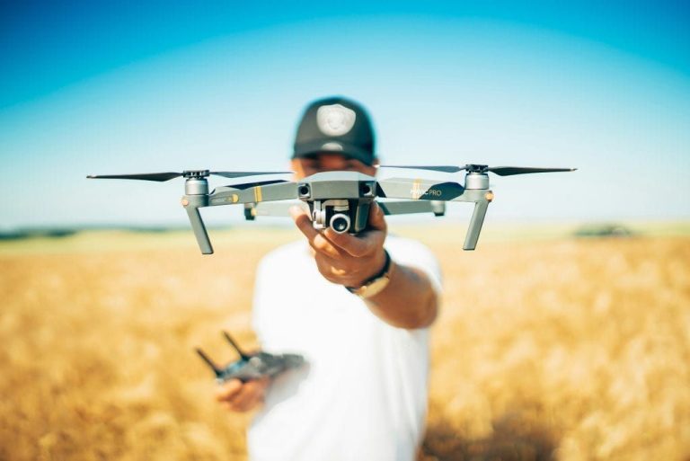 Professional drone operator preparing a drone for flight